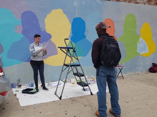 Artist Rose Jaffe beginning her work. Photo by Azita Mashayekhi.